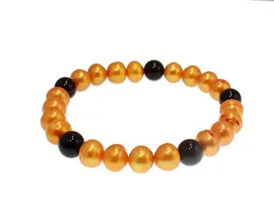 Pulsera perlas naranja onix
