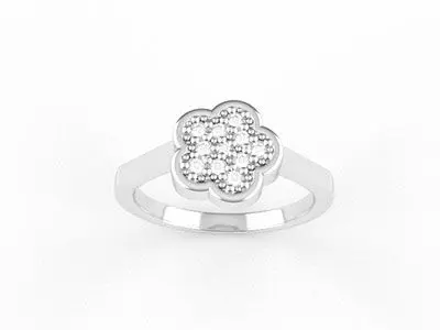 Anillo oro blanco y flor con cuajo de diamantes
