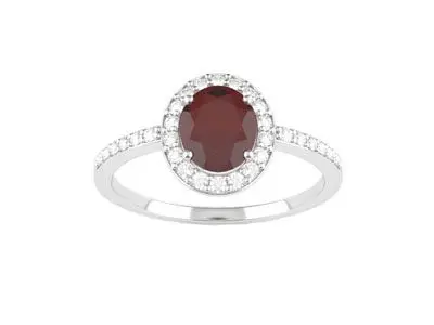 Anillo oro rubi oval y con cero y brazo de brillantes