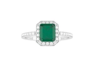 Anillo oro blanco esmeralda y brillantes