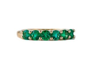 Anillo oro seis esmeraldas